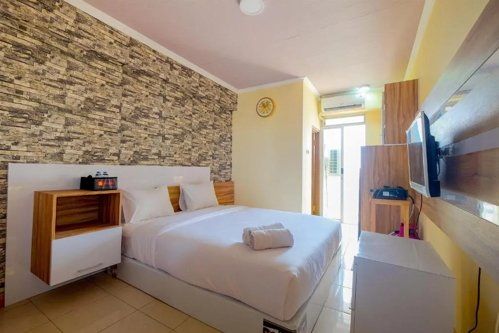 Minimalist and Comfy Studio at Pluit Sea View Apartment By Travelio, Jakarta, Indonezia