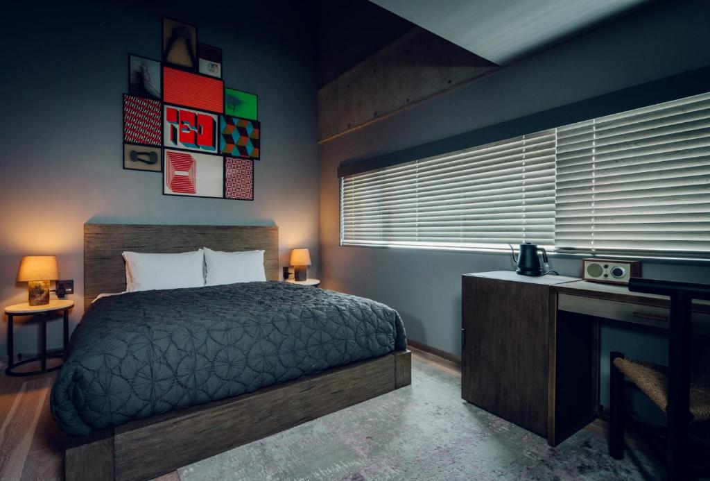 Postel nebo postele na pokoji v ubytování node hotel