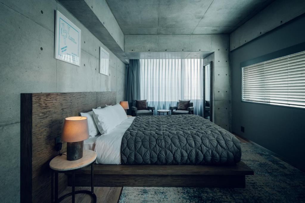Postel nebo postele na pokoji v ubytování node hotel