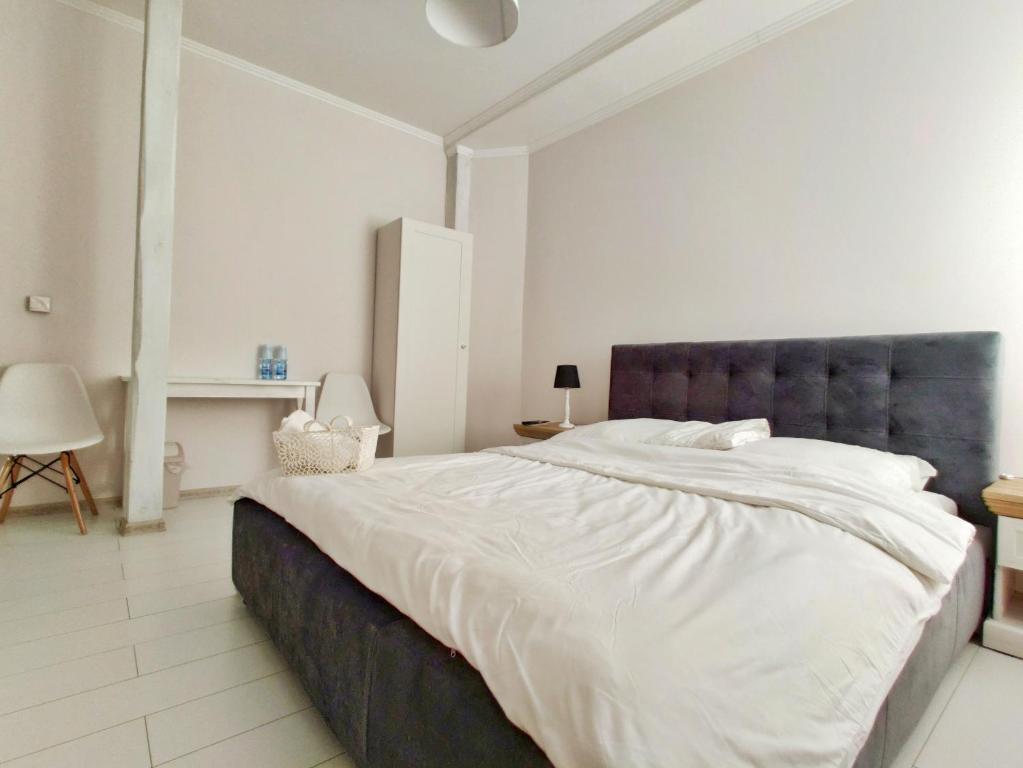 Posteľ alebo postele v izbe v ubytovaní B&B Źródlana 46