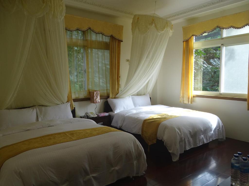 Postel nebo postele na pokoji v ubytování Emoonten Homestay