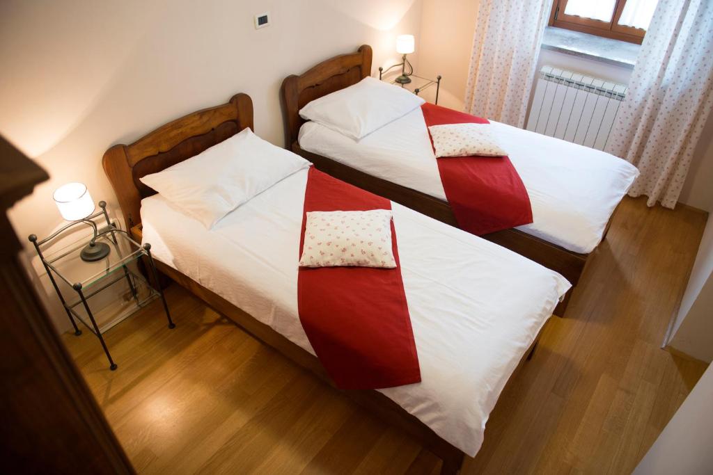 Postel nebo postele na pokoji v ubytování Guesthouse Muha