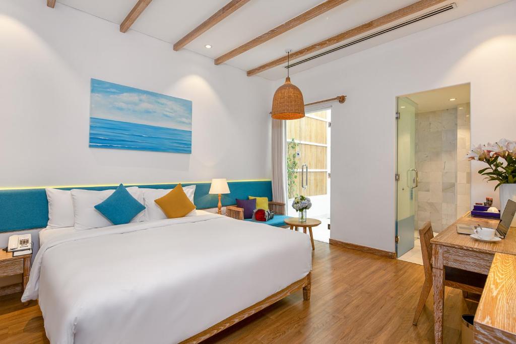 Letto o letti in una camera di Risemount Premier Resort Da Nang