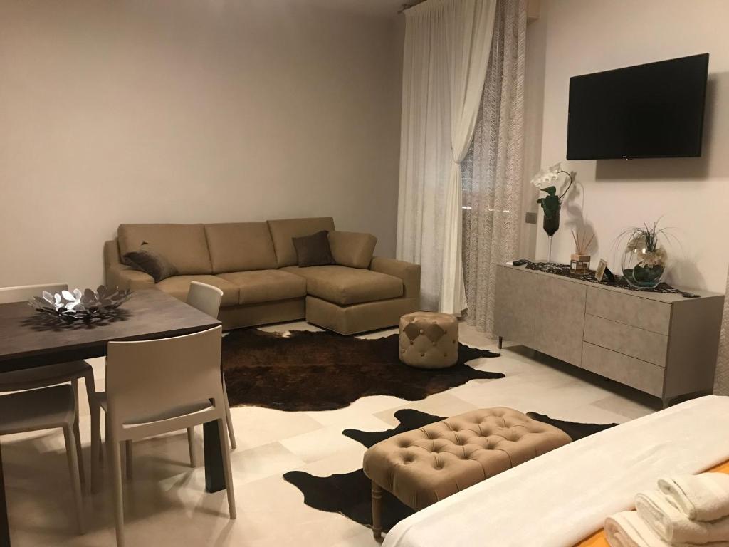 TV a/nebo společenská místnost v ubytování via roma 12 VERONA