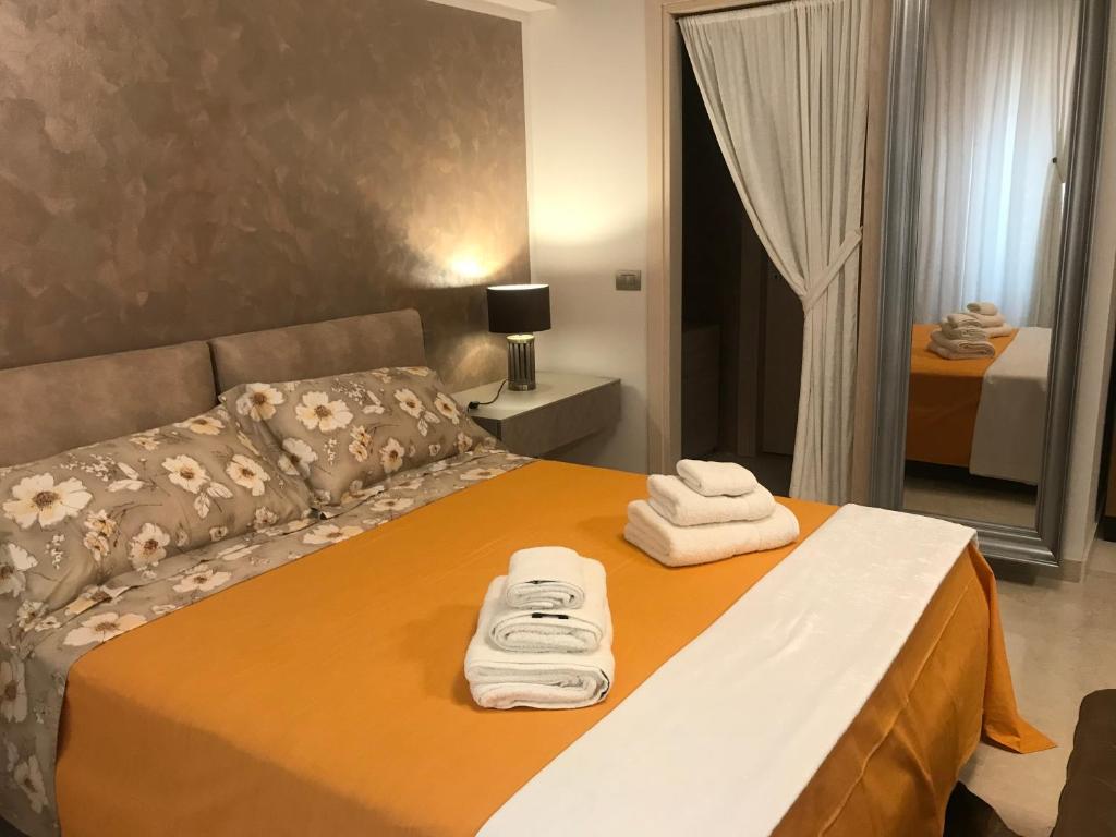 Postel nebo postele na pokoji v ubytování via roma 12 VERONA