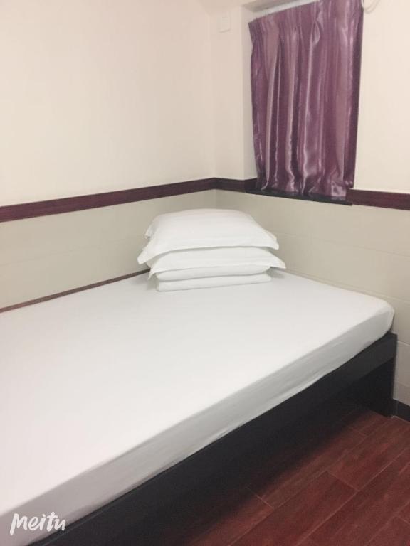 Postel nebo postele na pokoji v ubytování Hang Ho Hostel