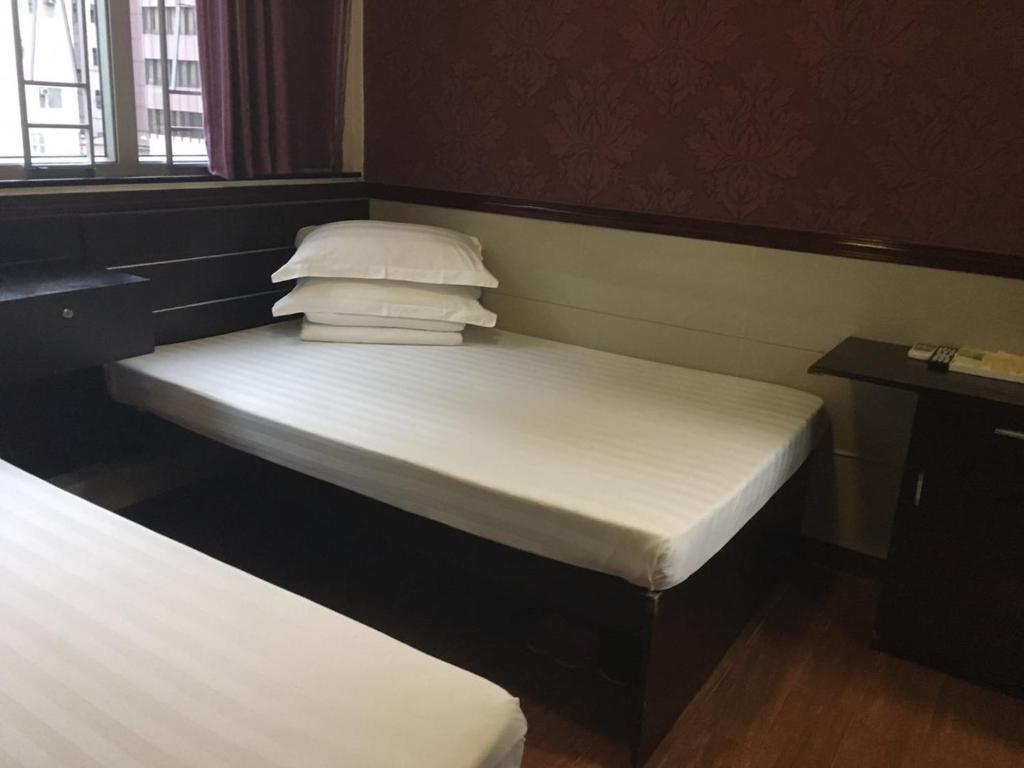 Postel nebo postele na pokoji v ubytování Hang Ho Hostel