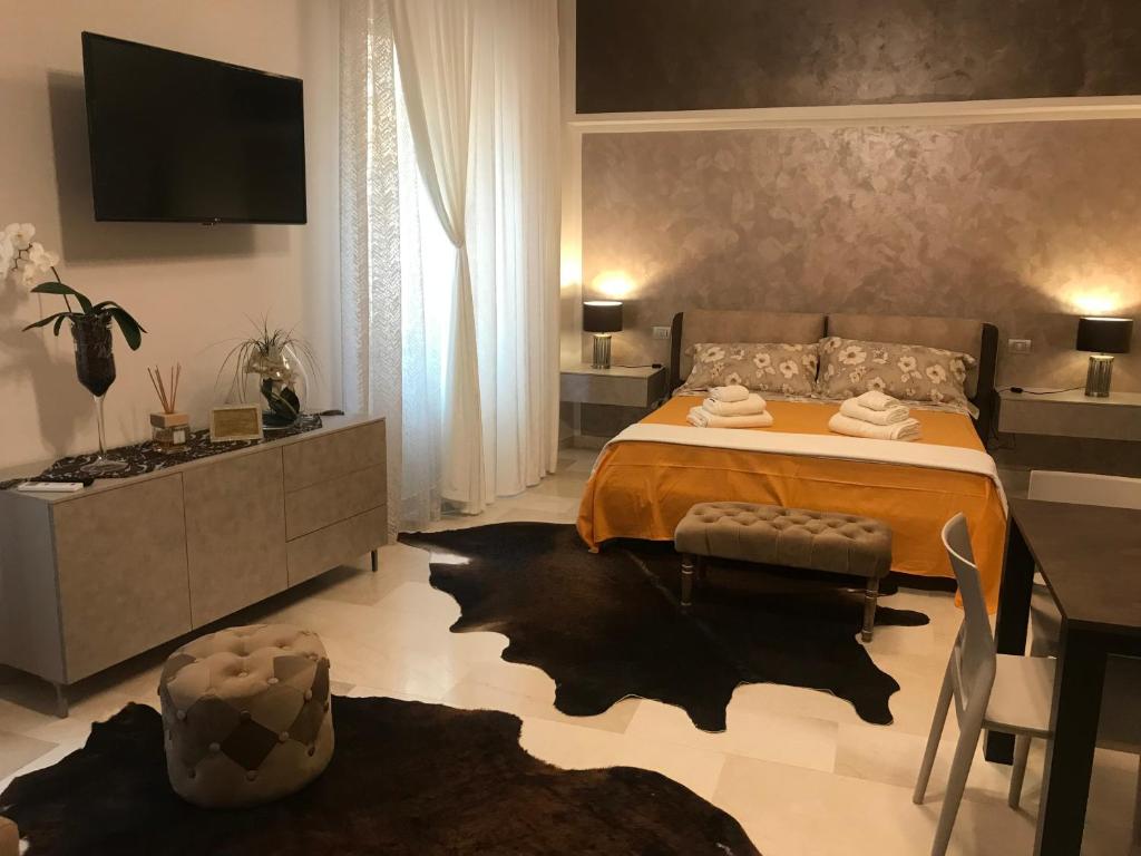 Postel nebo postele na pokoji v ubytování via roma 12 VERONA