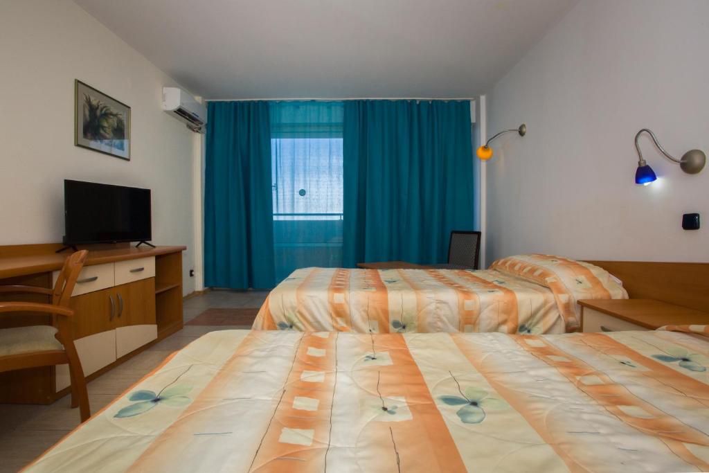 Postel nebo postele na pokoji v ubytování Royal Bay Hotel - All Inclusive