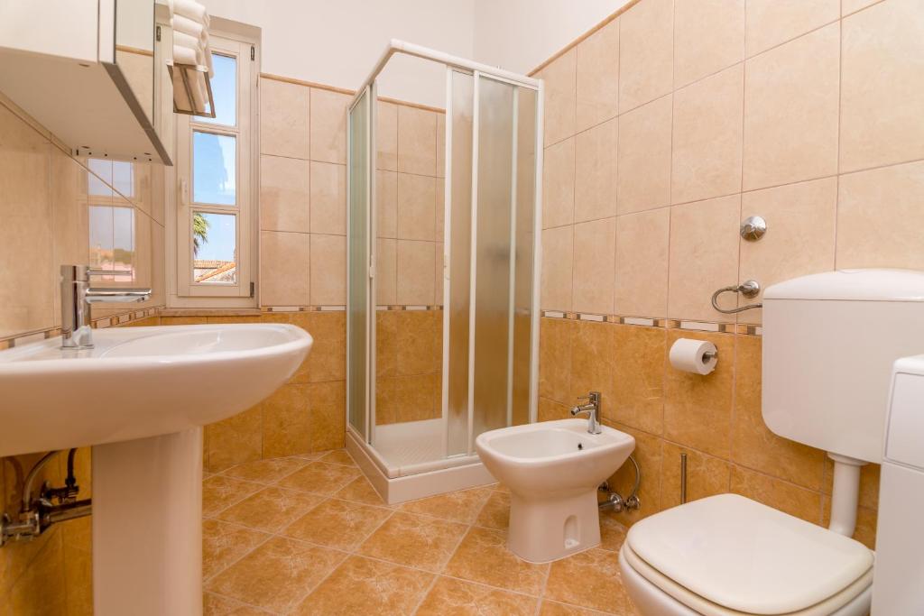 Koupelna v ubytování House Catania