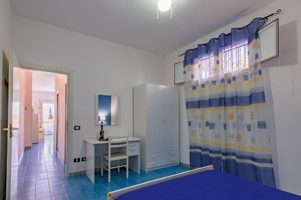 Postel nebo postele na pokoji v ubytování Lumia Case Vacanze