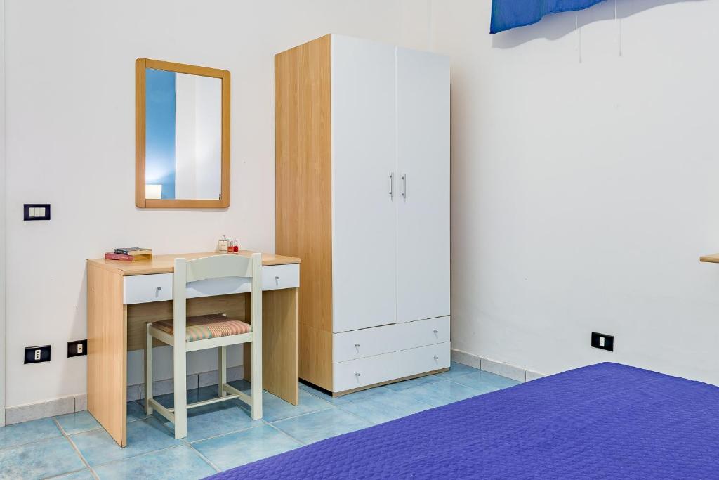 Postel nebo postele na pokoji v ubytování Lumia Case Vacanze