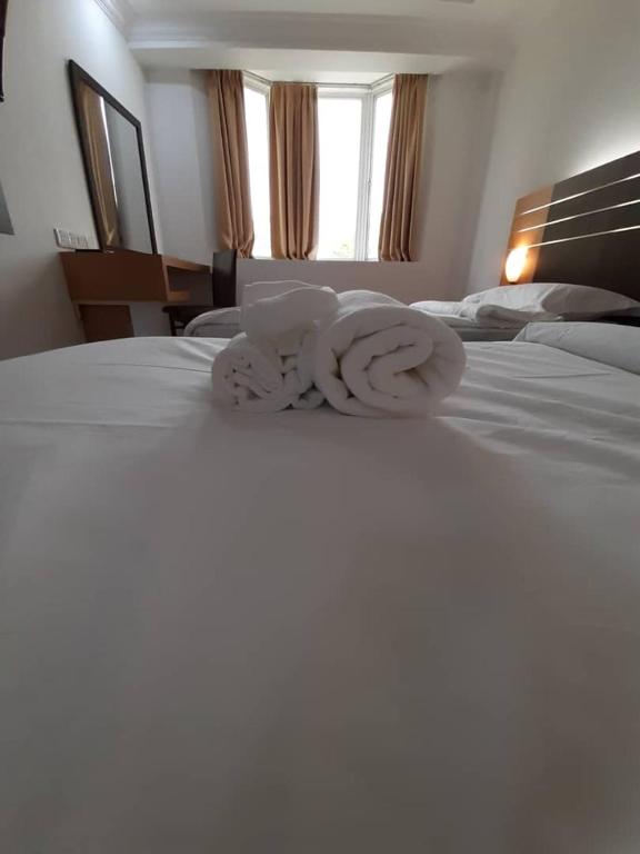 Postel nebo postele na pokoji v ubytování Sara Hotel