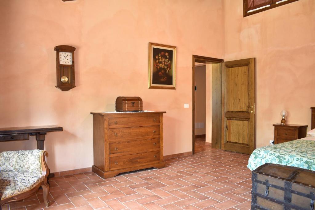Łóżko lub łóżka w pokoju w obiekcie Agriturismo Il Santo