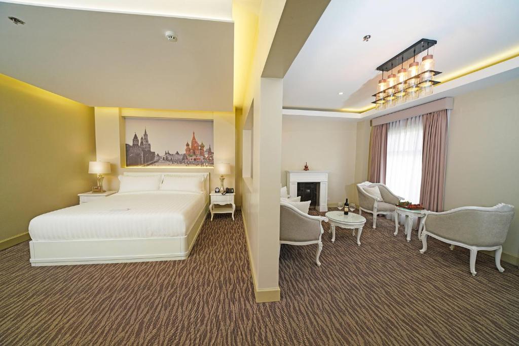 Postel nebo postele na pokoji v ubytování Hotel Carlito Tagaytay