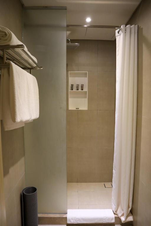 Koupelna v ubytování Mella Hotel