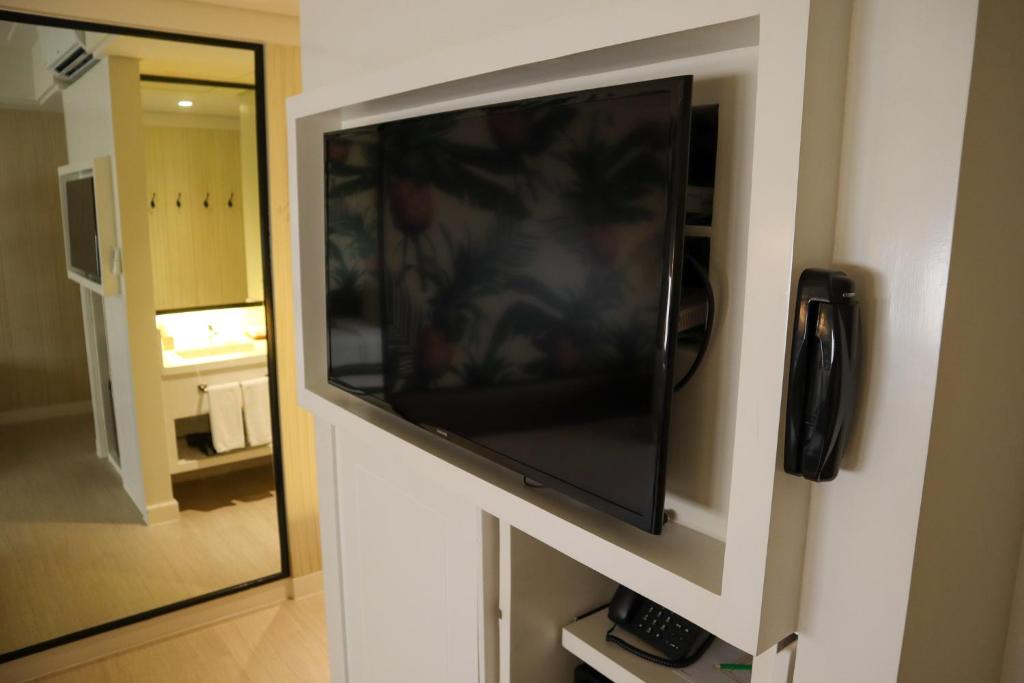 TV a/nebo společenská místnost v ubytování Mella Hotel