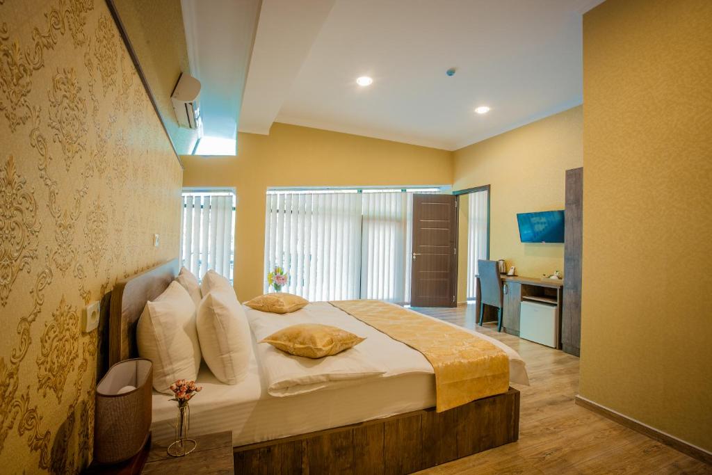 Postel nebo postele na pokoji v ubytování Hotel Comfort Tbilisi