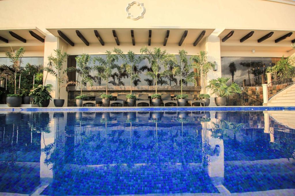 Bazén v ubytování Mella Hotel nebo v jeho okolí