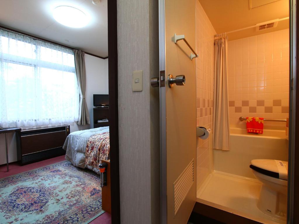 Koupelna v ubytování Hotel Mumon