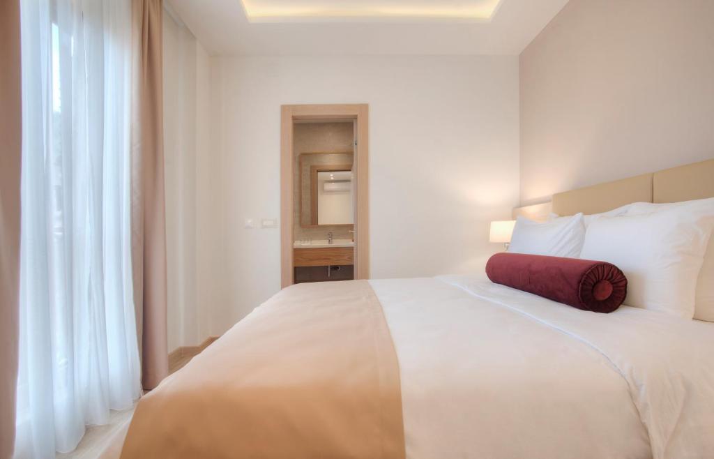 Postel nebo postele na pokoji v ubytování Hotel Vela