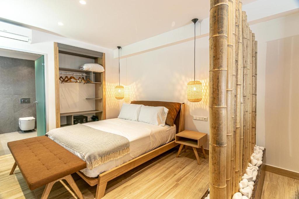 Postel nebo postele na pokoji v ubytování F & S LOUNGE SUITES