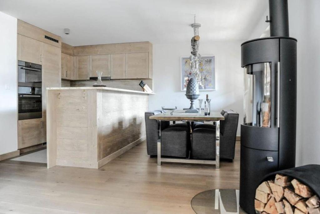Kuchyň nebo kuchyňský kout v ubytování Luxury Grimentz Apartment
