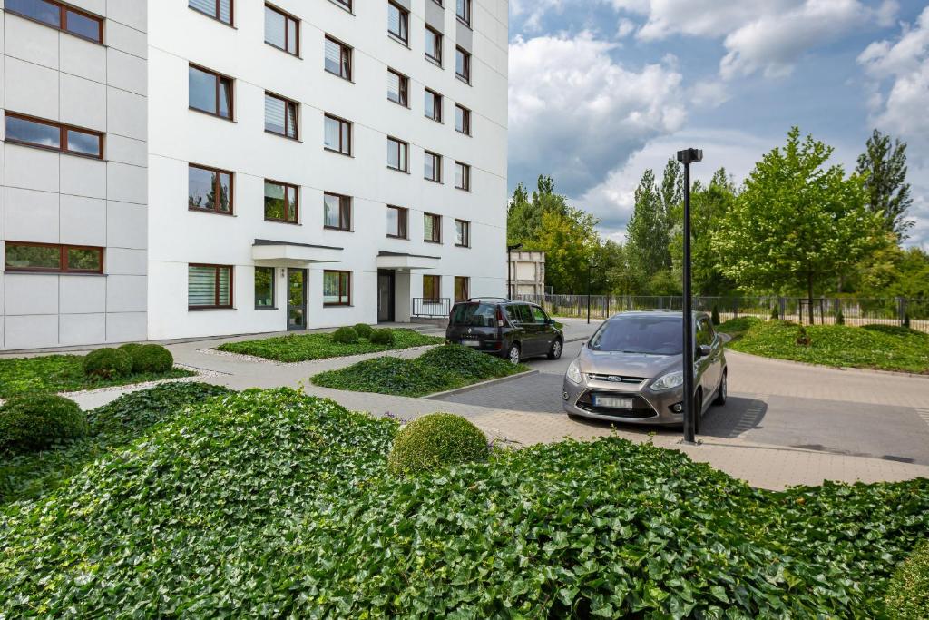 Vonkajšia záhrada v ubytovaní Apartment Warsaw Airport Kłobucka by Noclegi Renters