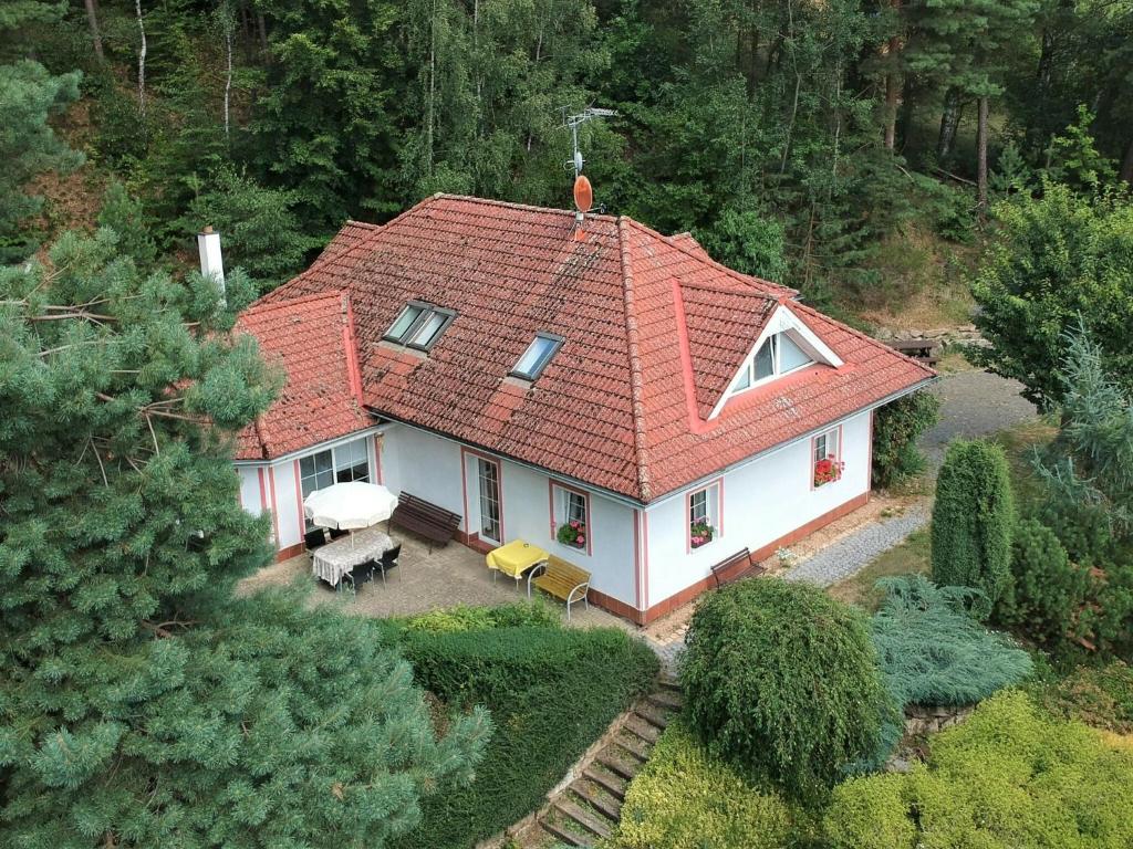 an aerial view of a house with a red roof at Comfortable detached house with large garden in Klokočí