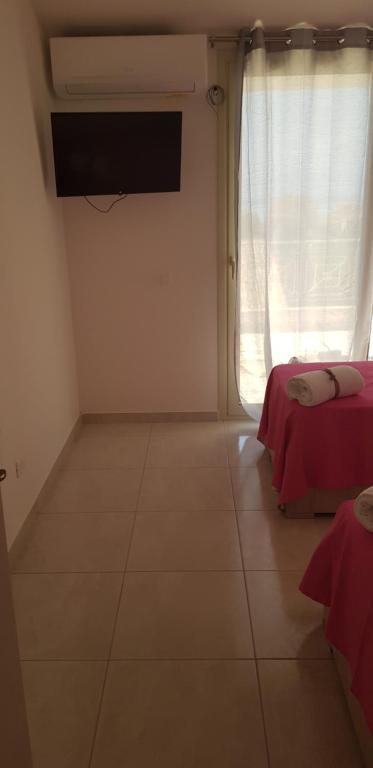 A television and/or entertainment centre at Le Quattro Rose