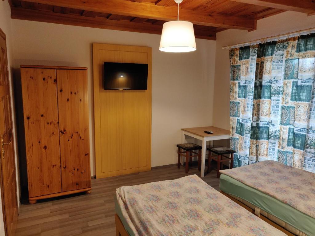 Posteľ alebo postele v izbe v ubytovaní Vilma Villa