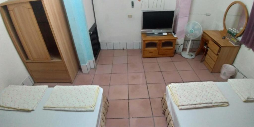 TV a/nebo společenská místnost v ubytování Sun Wu Homestay