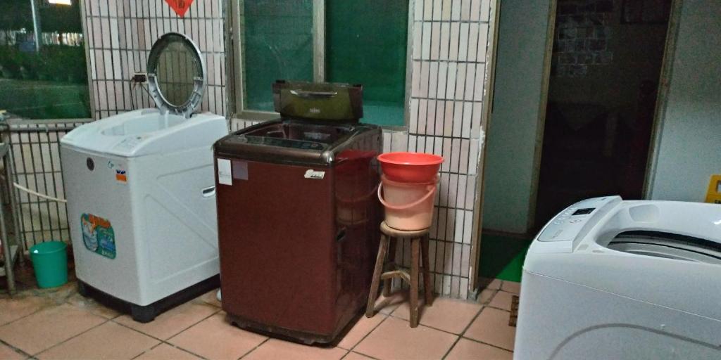 Kuchyň nebo kuchyňský kout v ubytování Sun Wu Homestay