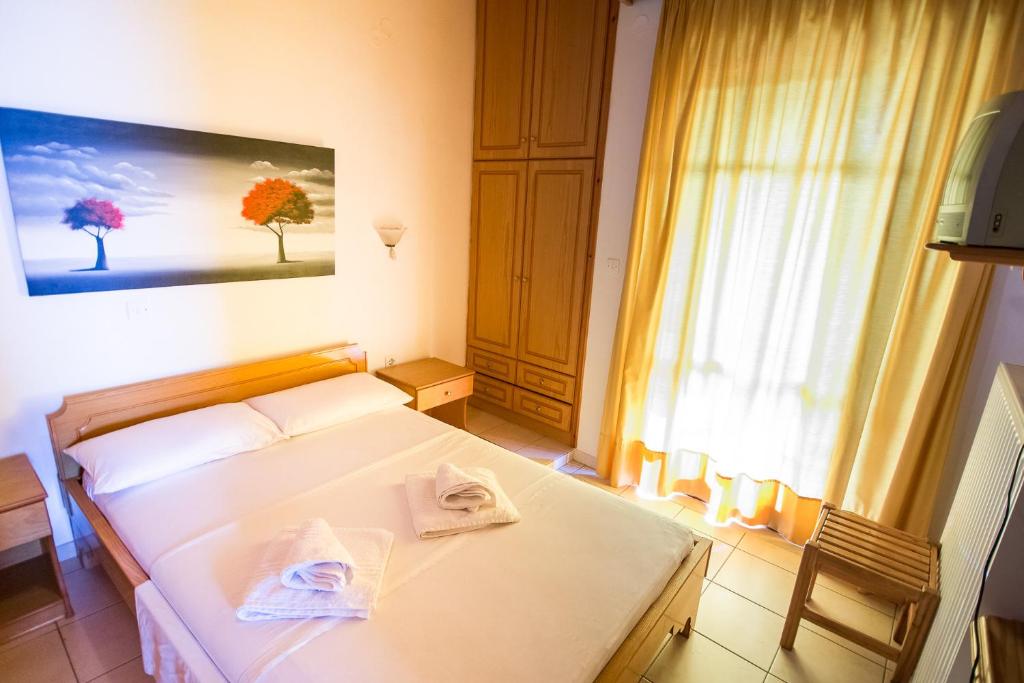 Posteľ alebo postele v izbe v ubytovaní Margarita Apartments