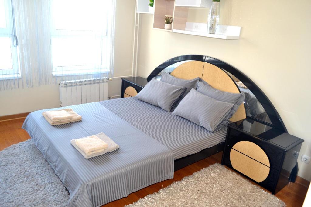 Postel nebo postele na pokoji v ubytování Clean&Cozy Apartments Novi Beograd