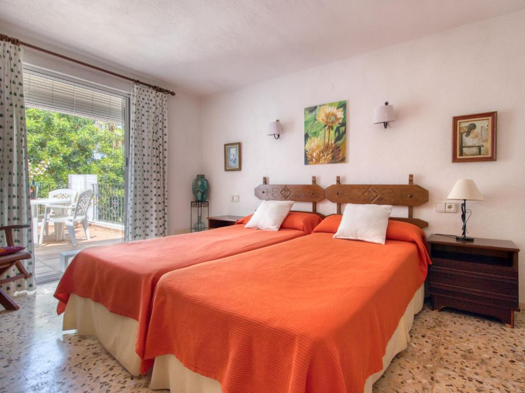 A bed or beds in a room at Holiday Home Florencia by Interhome