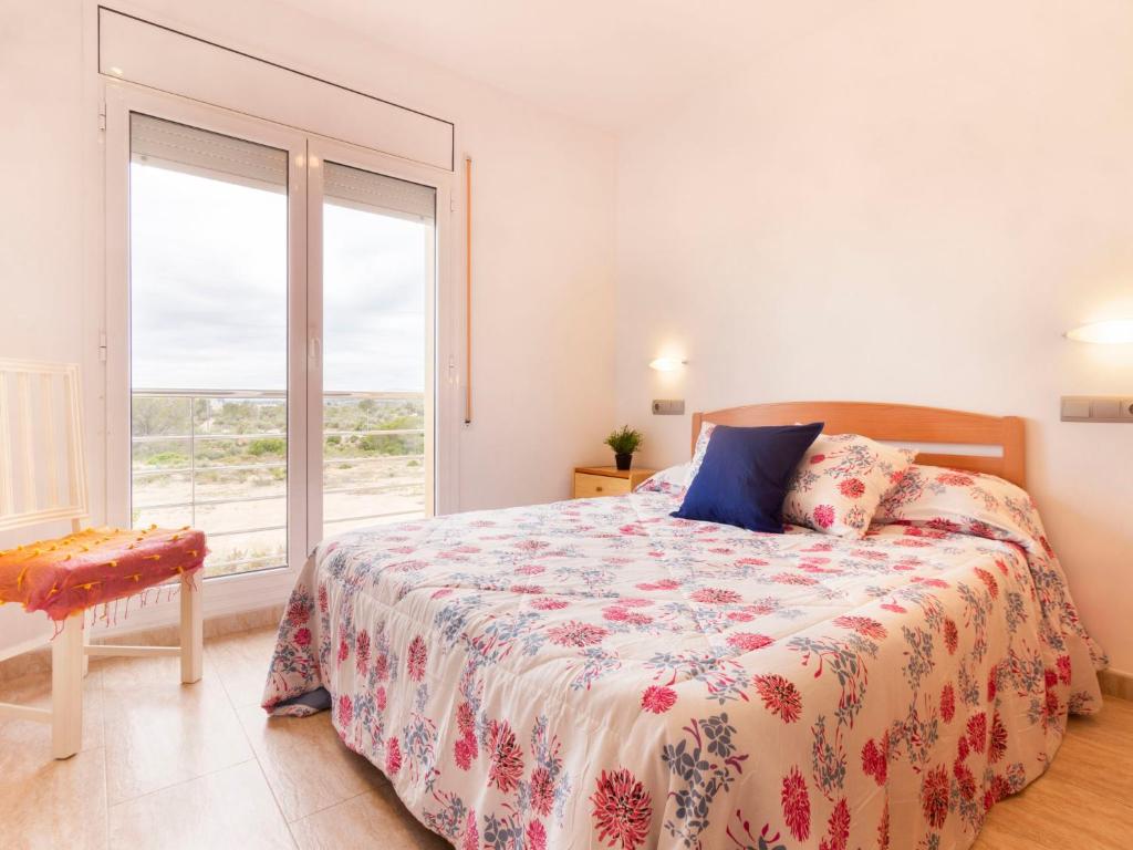 Postel nebo postele na pokoji v ubytování Holiday Home Cap Roig by Interhome