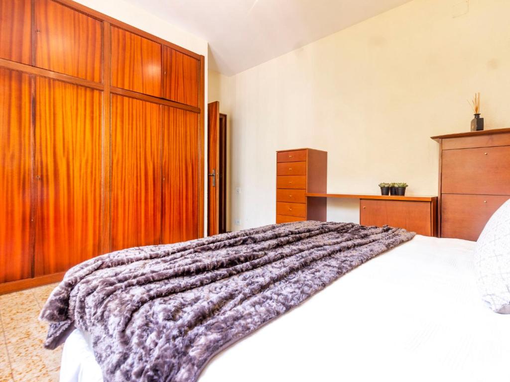 A bed or beds in a room at Holiday Home Villa Esplai by Interhome