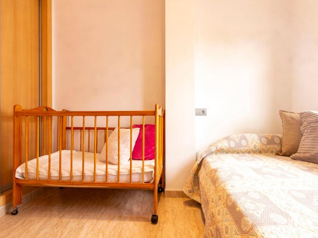Postel nebo postele na pokoji v ubytování Holiday Home Cap Roig by Interhome