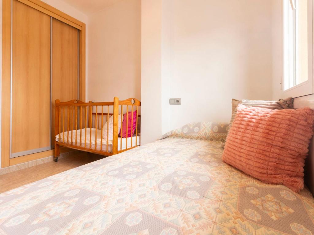 Postel nebo postele na pokoji v ubytování Holiday Home Cap Roig by Interhome