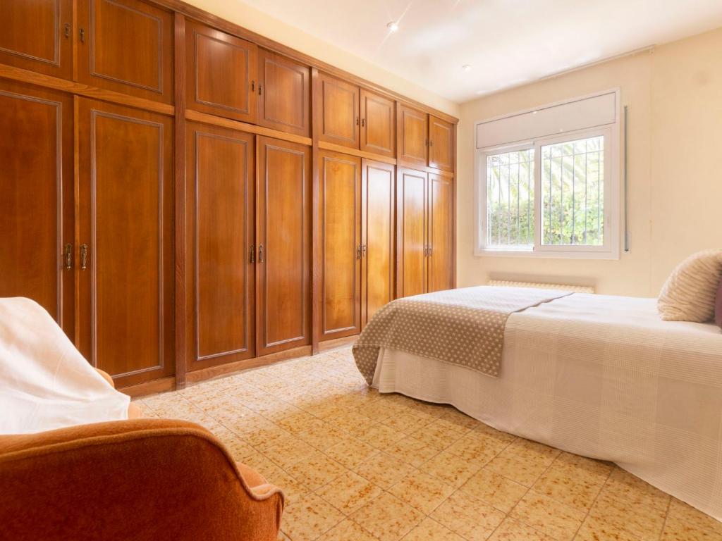 A bed or beds in a room at Holiday Home Villa Esplai by Interhome