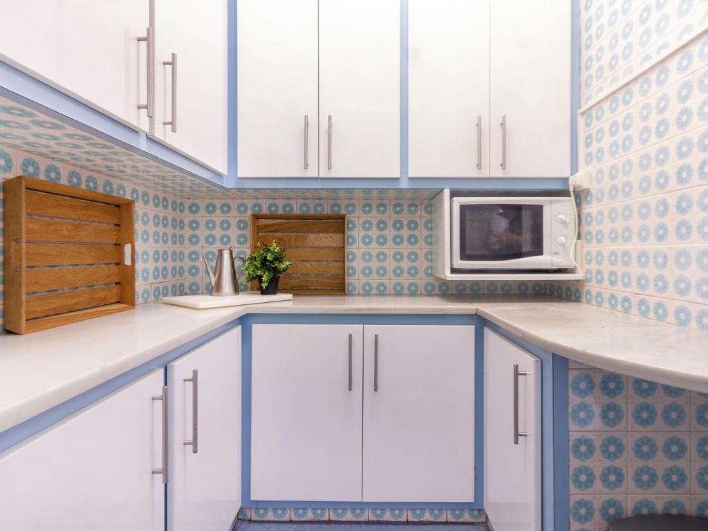 A kitchen or kitchenette at Holiday Home Villa Esplai by Interhome