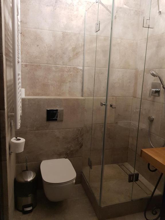 Kúpeľňa v ubytovaní Apartamenty Centrum RS SUITES Kowalska 12