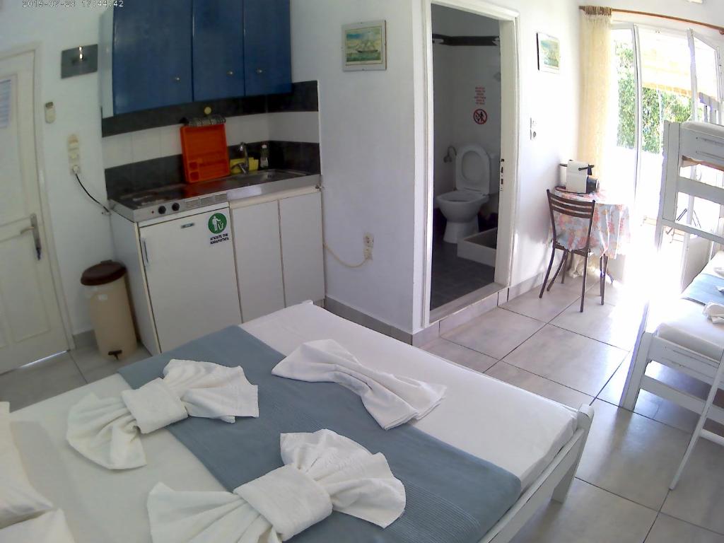 Kuchyň nebo kuchyňský kout v ubytování Apanemia Rooms
