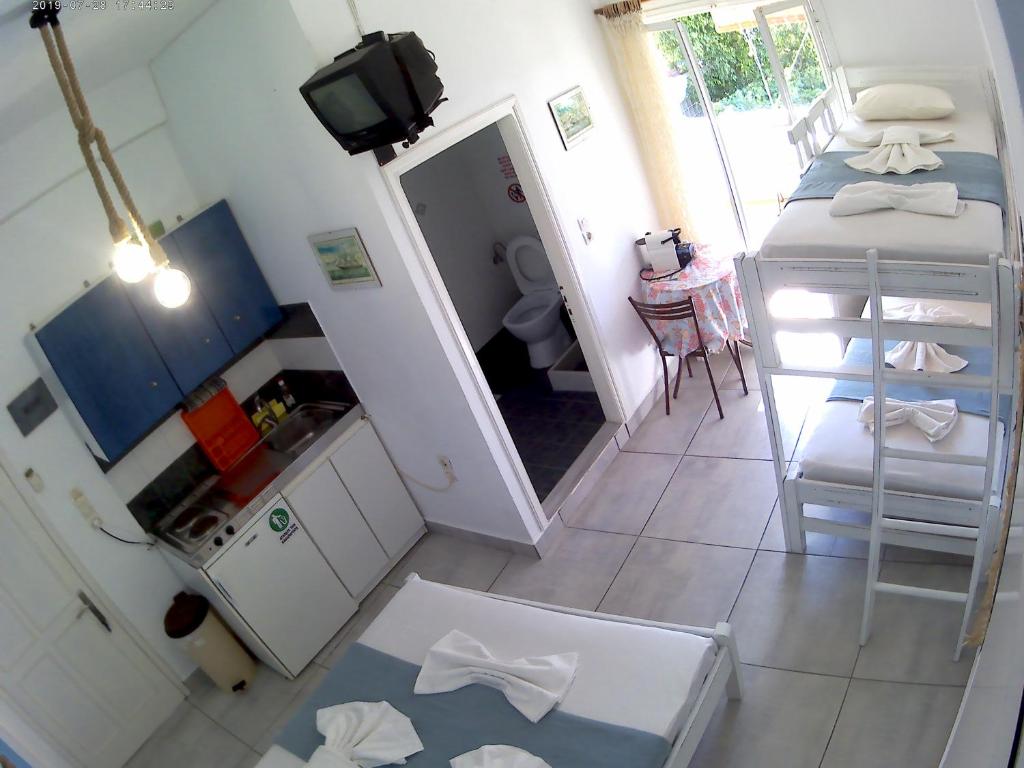 Kuchyň nebo kuchyňský kout v ubytování Apanemia Rooms