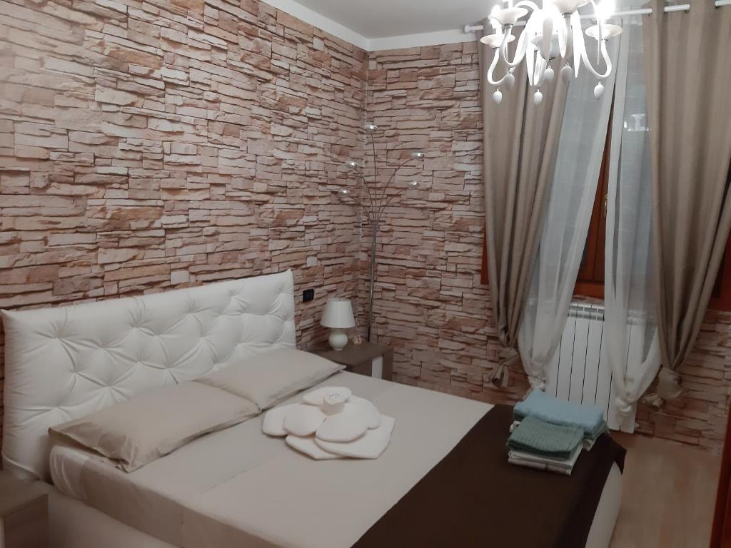 Łóżko lub łóżka w pokoju w obiekcie Casarelax