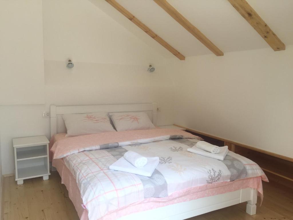 Postel nebo postele na pokoji v ubytování Guest House Dzakovic Stana