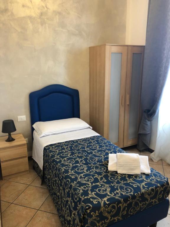 A bed or beds in a room at B&B La Cittadella