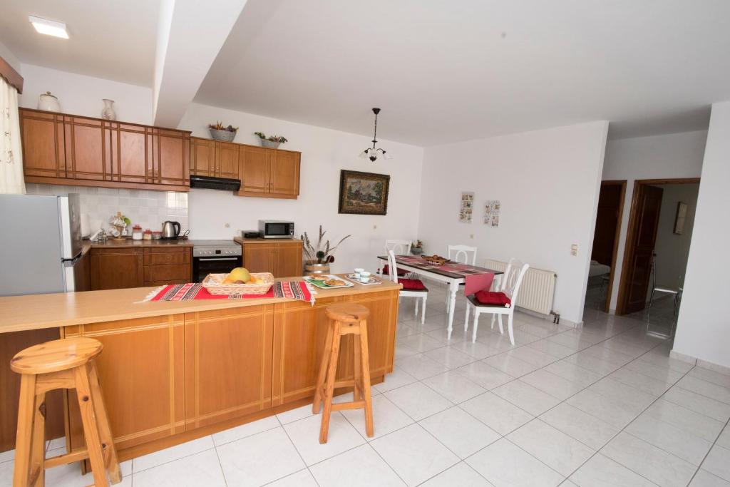 Kuchnia lub aneks kuchenny w obiekcie KOS Family House