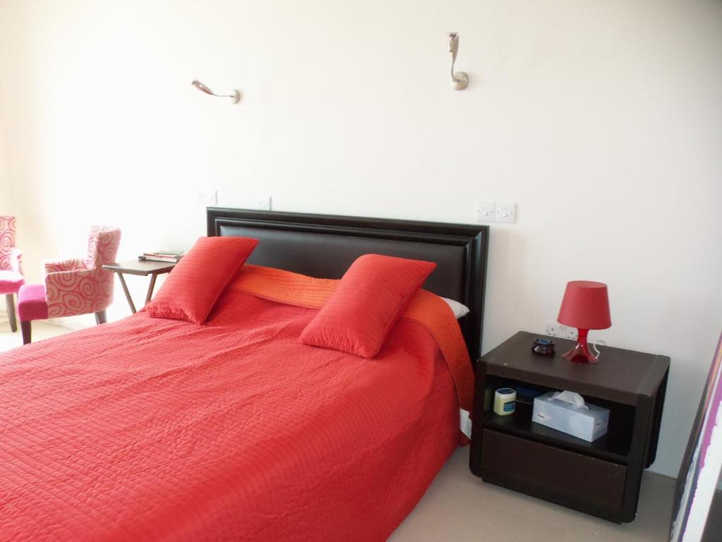 Postel nebo postele na pokoji v ubytování Beach Villa Pantheon